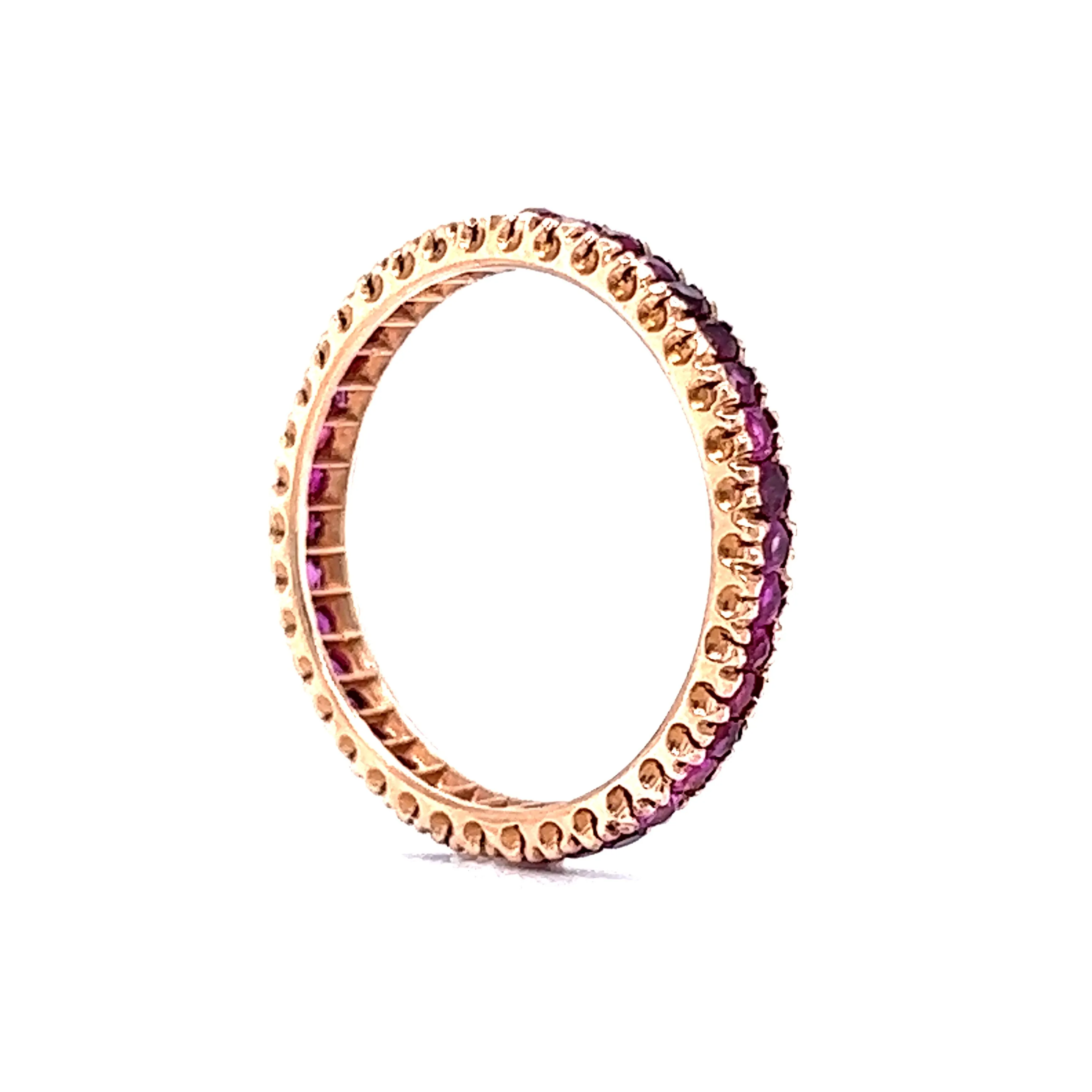 .95 Round Cut Ruby Eternity Wedding Band in 14k Rose Gold