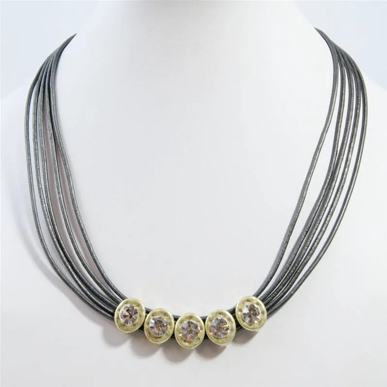 Beaten style round stones on multi strand leather necklace